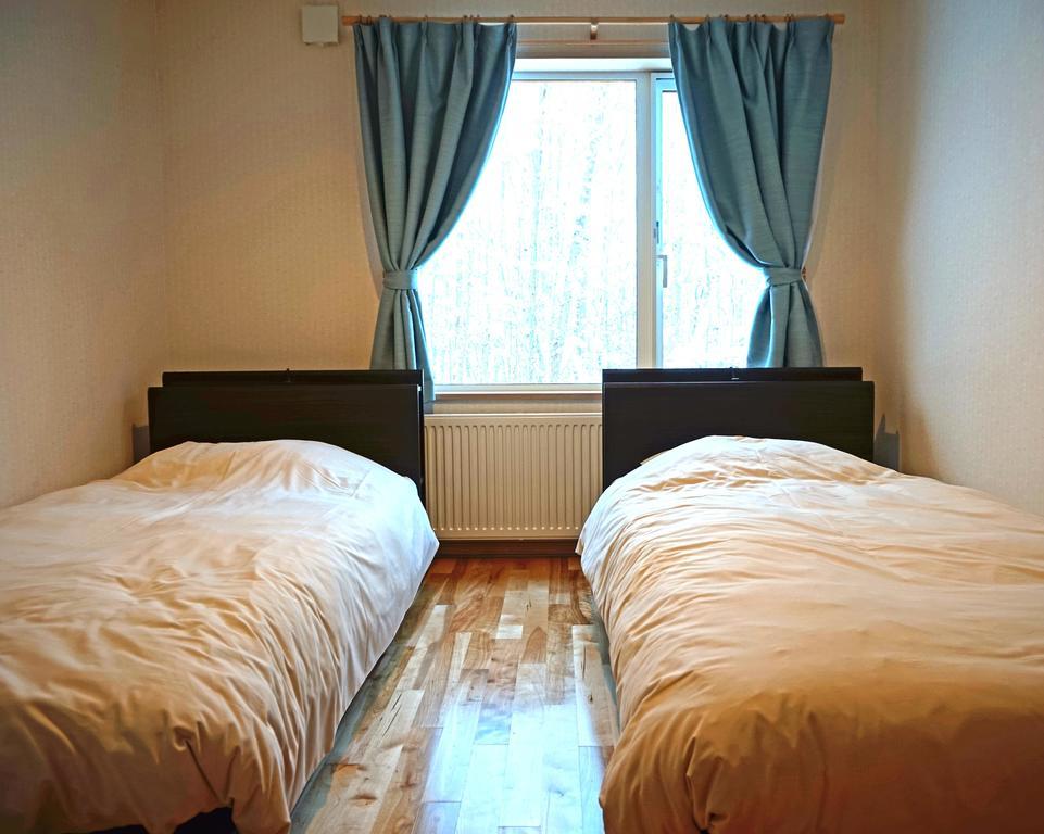 Ituka Furano e Guest House Bagian luar foto