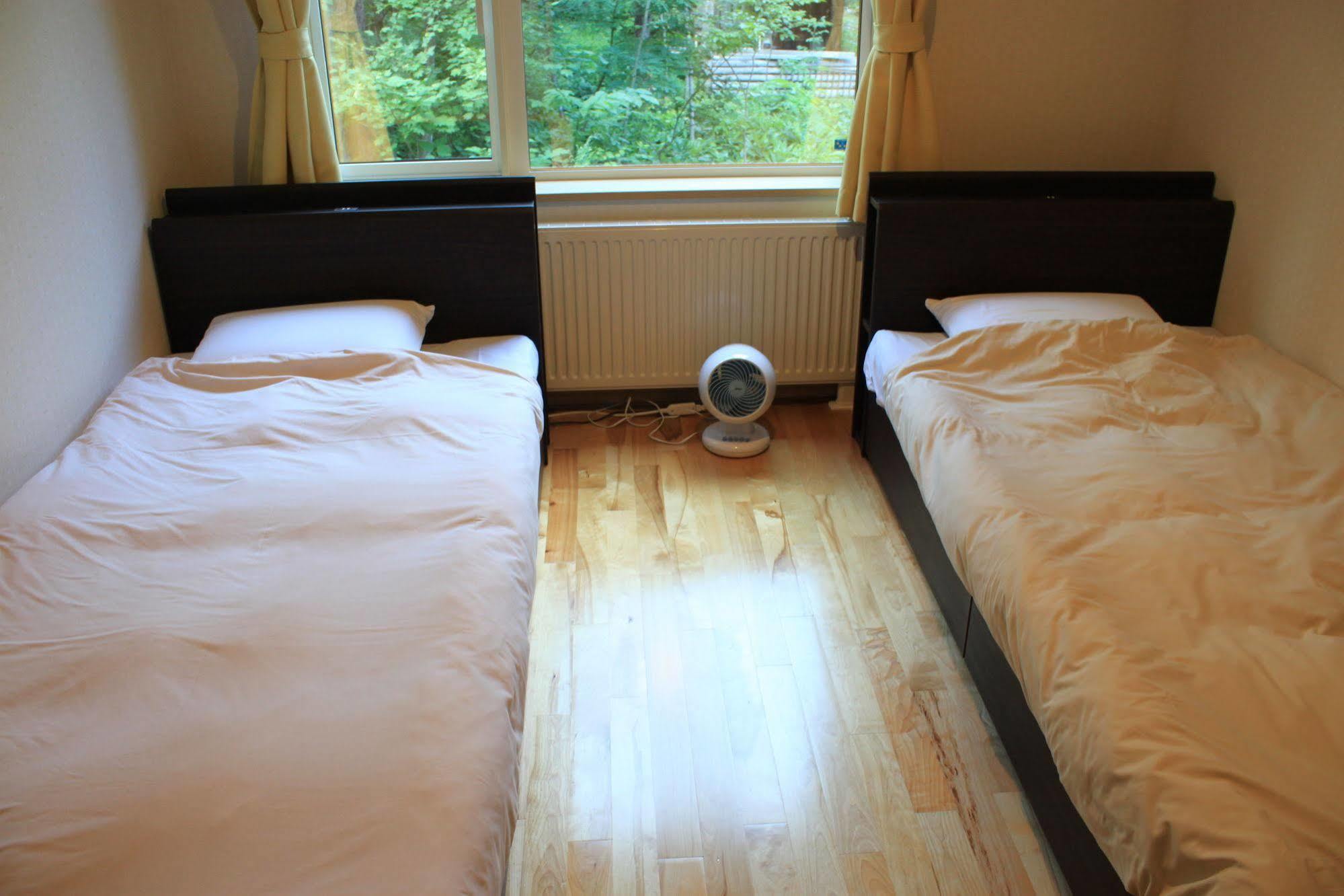 Ituka Furano e Guest House Bagian luar foto